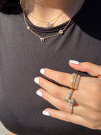 The Serpentine Heart & Emerald-Cut Wrap Ring